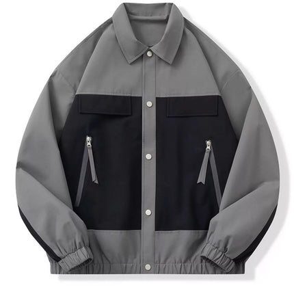Men's full size snap down long sleeve jacket in gray and black with button closure and zippered pockets