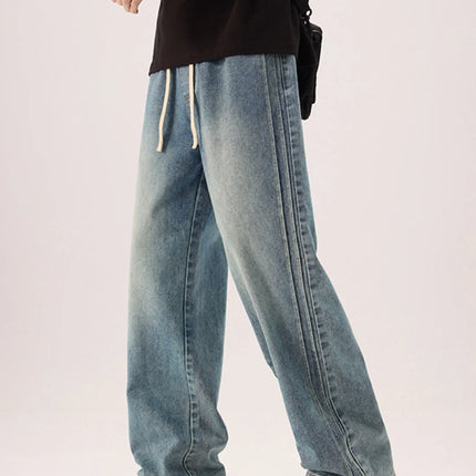 Men's plus size wide leg washed jeans in 100% cotton with slight stretch and drawstring waist