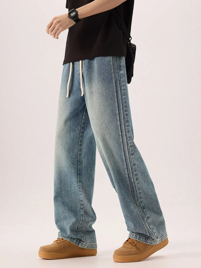 Men's plus size wide leg washed jeans in 100% cotton with slight stretch and drawstring waist