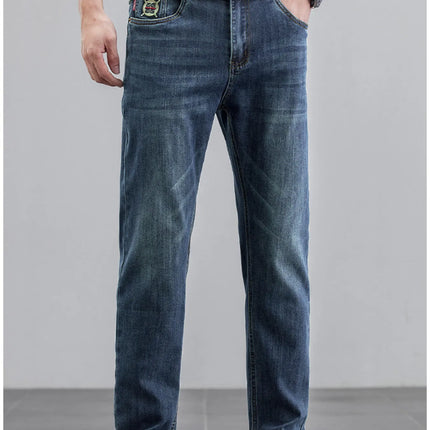 Men's straight leg wash jeans in dark blue with slight stretch and basic style