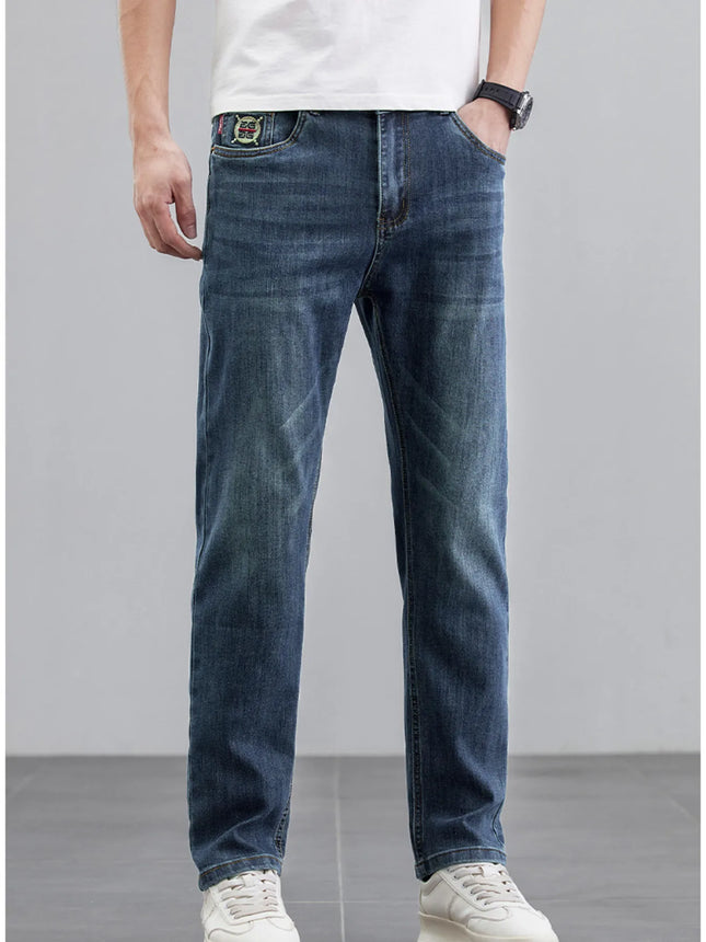 Men's straight leg wash jeans in dark blue with slight stretch and basic style