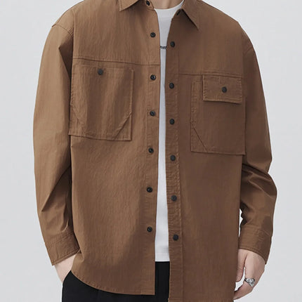 Men's plus size button up long sleeve brown shirt with chest pockets and black buttons
